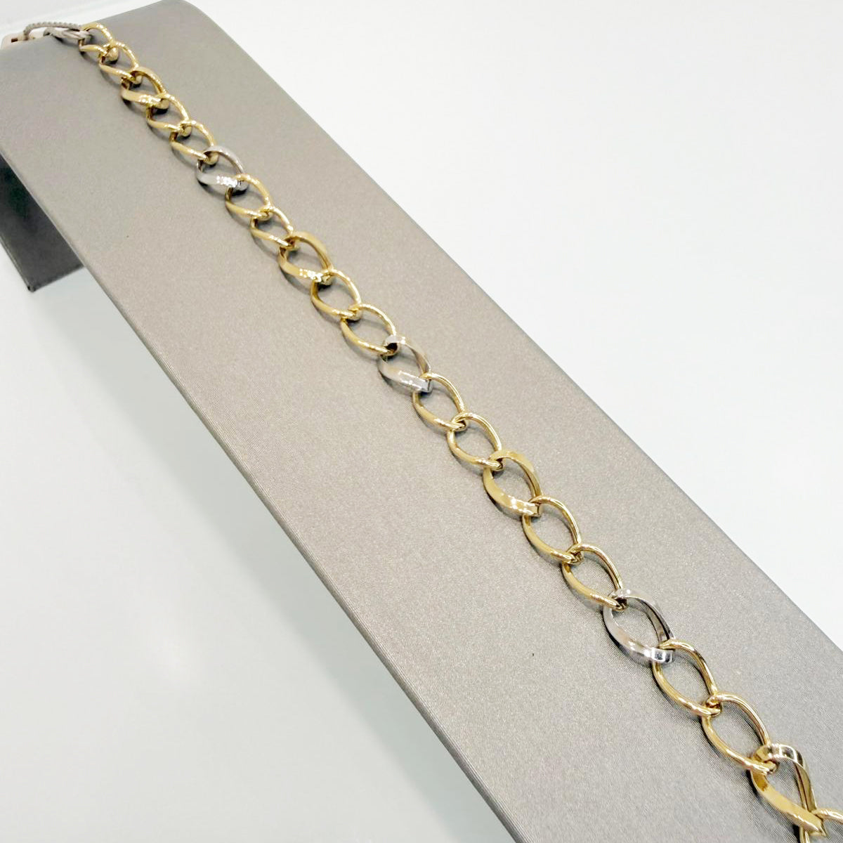 Bracciale in oro giallo e bianco 18KT (750) a maglia alternata