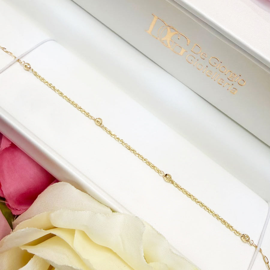 Bracciale con sfere diamantate in oro giallo 18 KT (750)