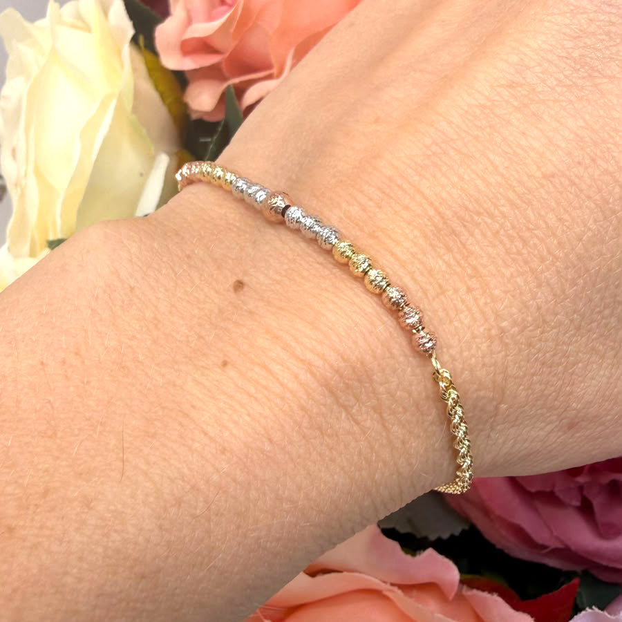 Bracciale con sfere diamantate tricolore in oro 18 KT (750)