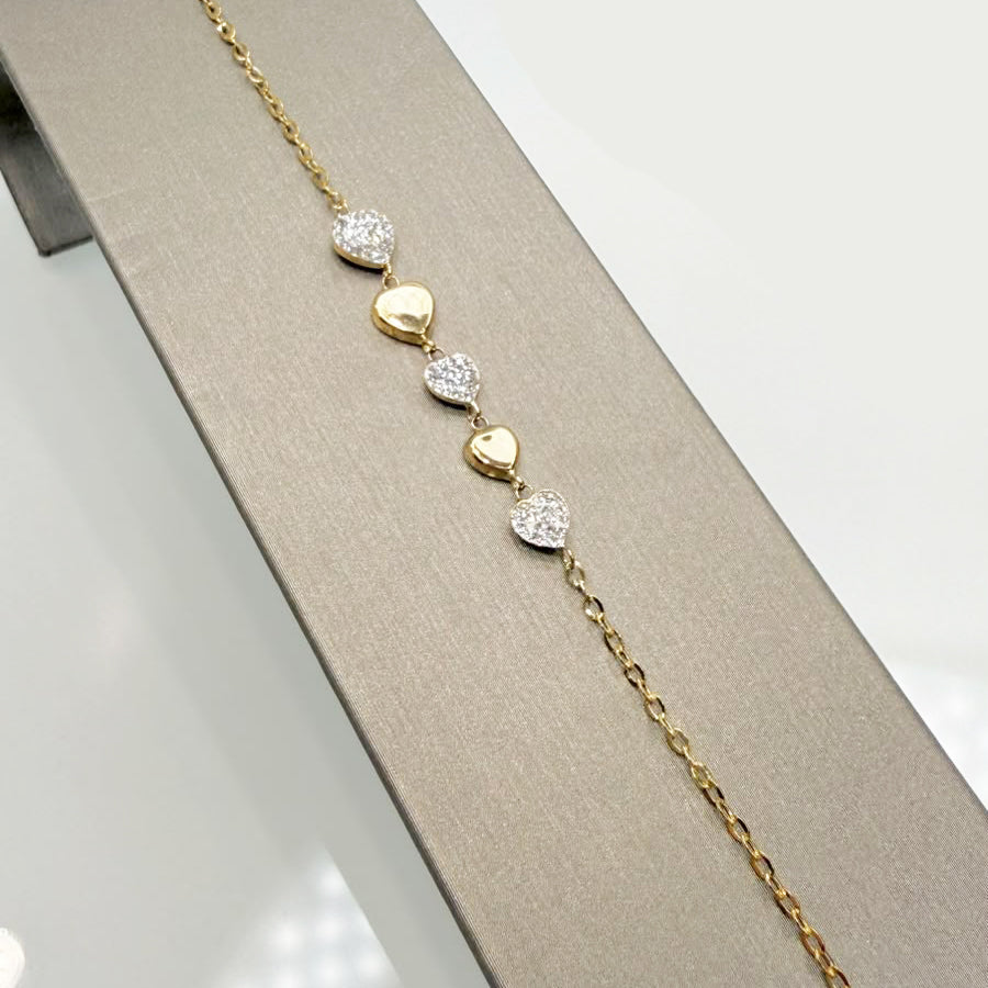 Bracciale cuori con zirconi in oro giallo 18 KT (750)