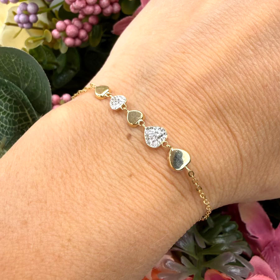 Bracciale cuori con zirconi in oro giallo 18 KT (750)