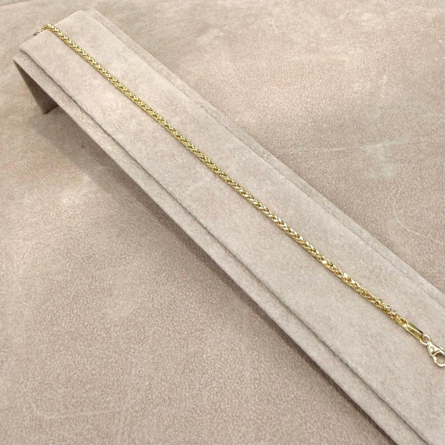 Bracciale Intrecciato Luminoso in Oro Giallo 18 KT