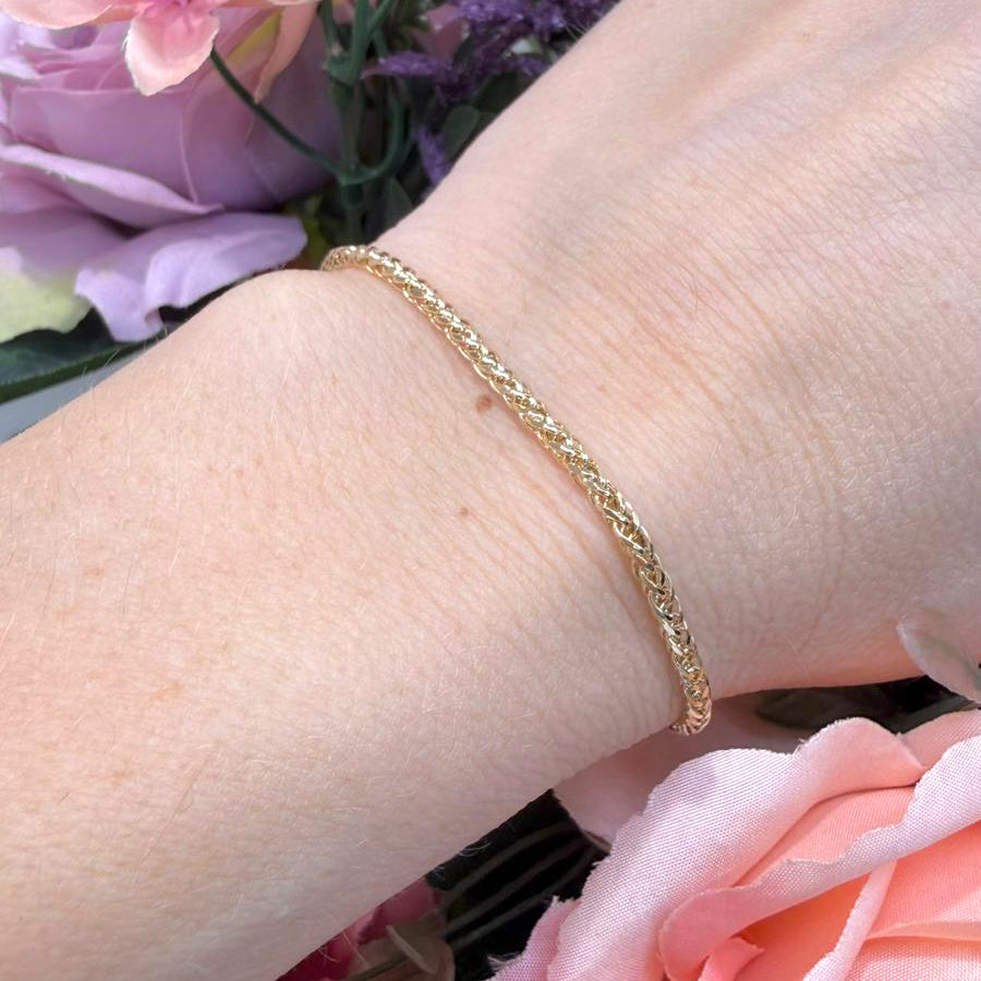 Bracciale Intrecciato Luminoso in Oro Giallo 18 KT