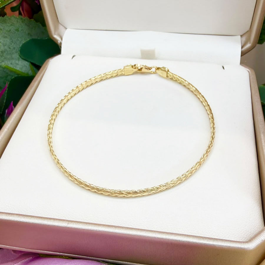 BRACCIALE SEMIRIGIDO IN ORO GIALLO 18 KT (750)