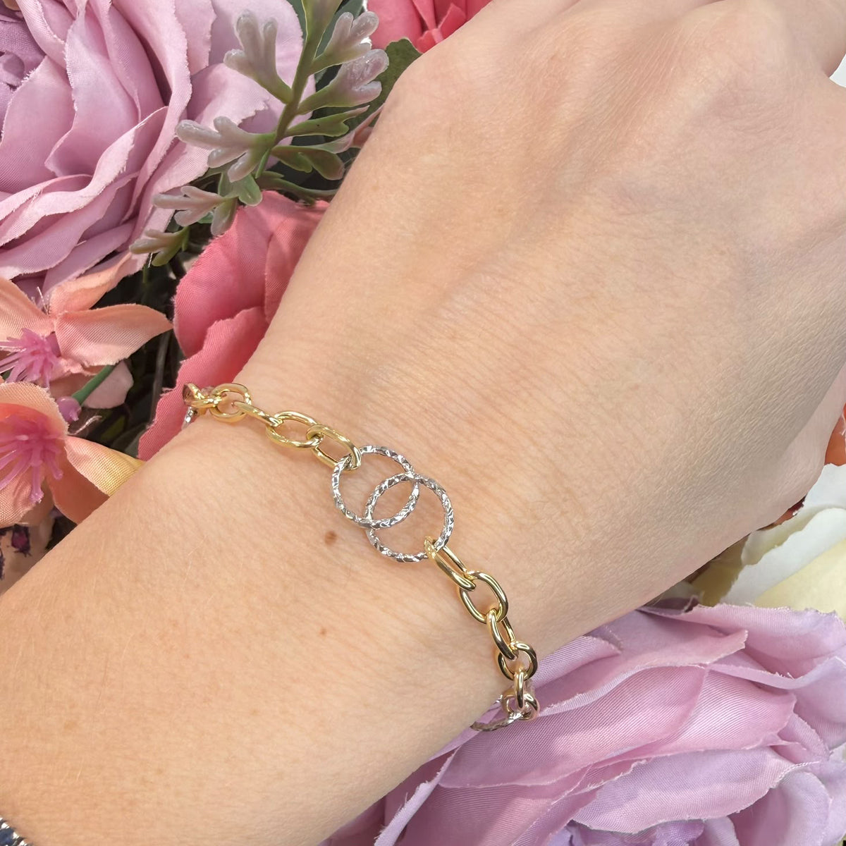 BRACCIALE IN ORO GIALLO E BIANCO 18 KT (750) CON CERCHI INTRECCIATI