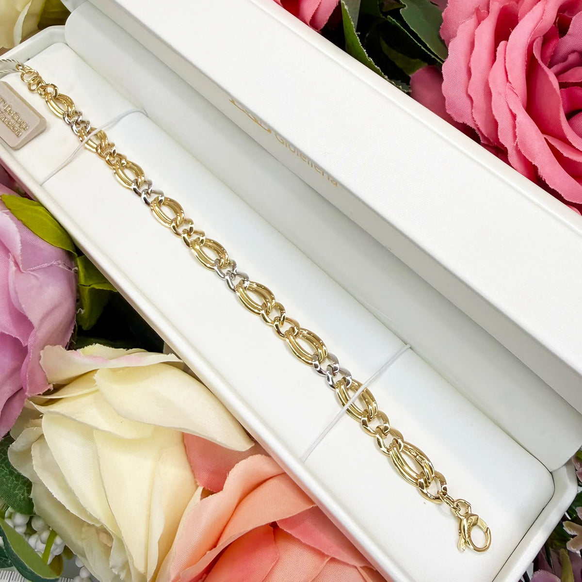 BRACCIALE IN ORO GIALLO E BIANCO 18 KT (750) CON MAGLIE OVALI