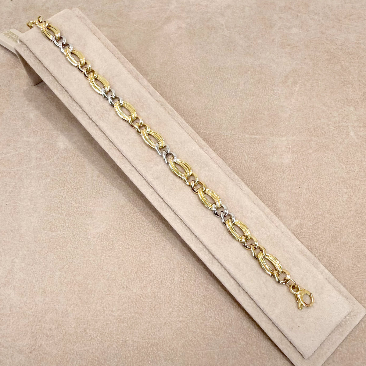 BRACCIALE IN ORO GIALLO E BIANCO 18 KT (750) CON MAGLIE OVALI
