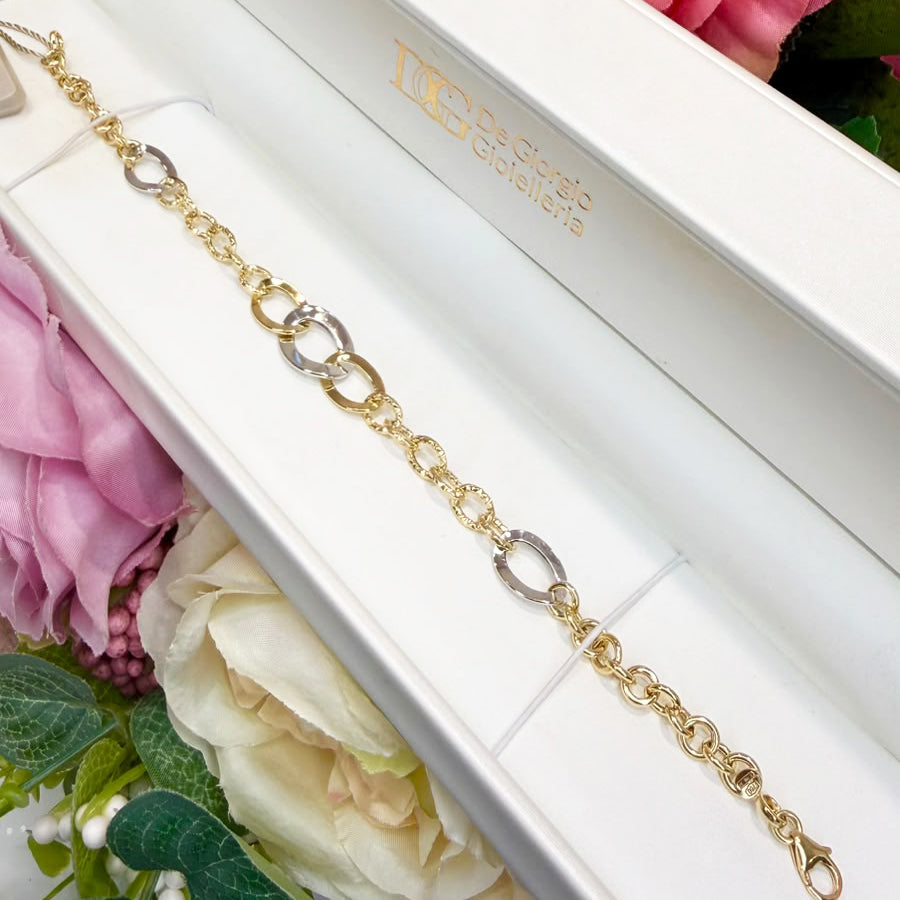 BRACCIALE IN ORO GIALLO E BIANCO 18 KT (750) CON MAGLIE OVALI