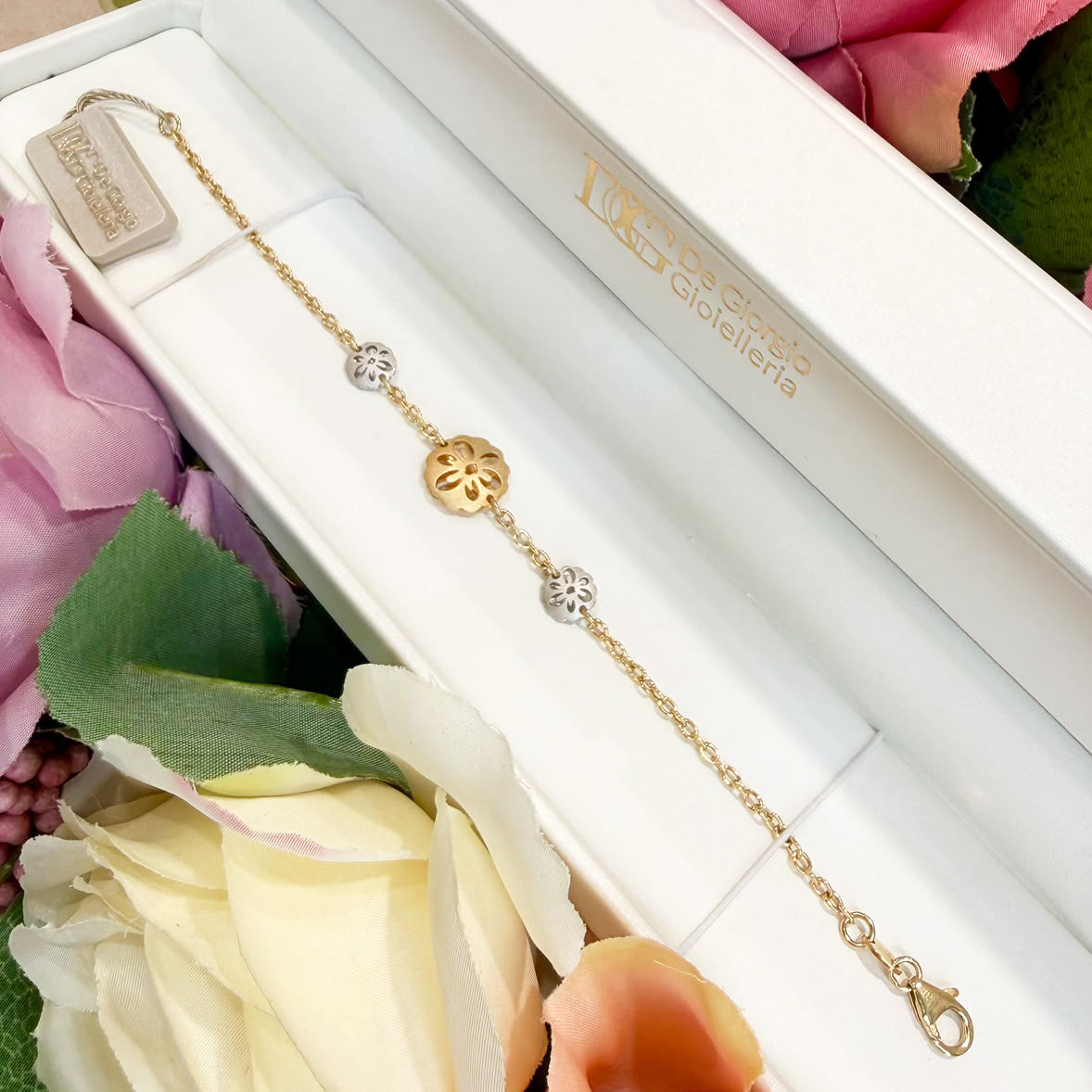 BRACCIALE CON FIORI BICOLORE IN ORO 18 KT (750)