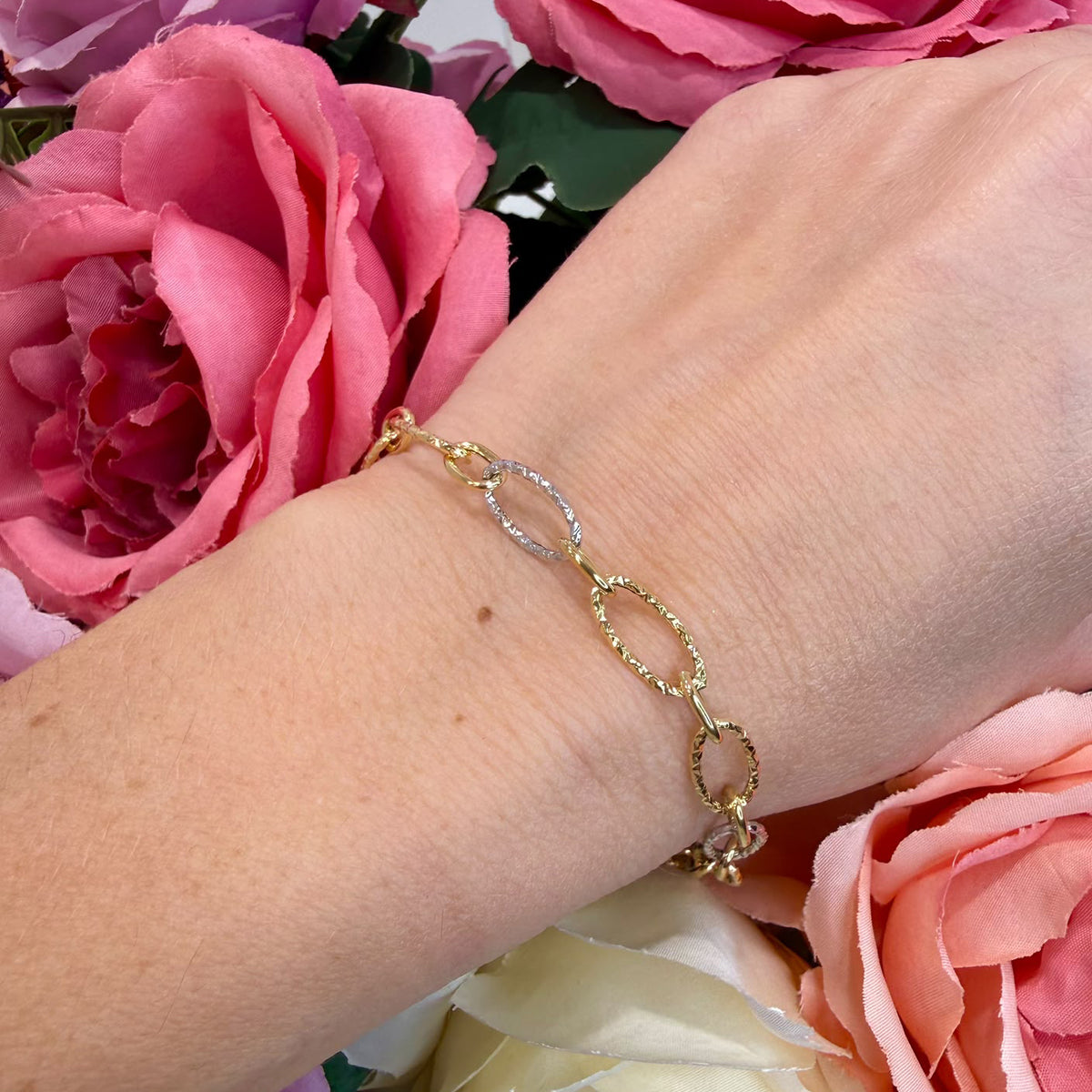 BRACCIALE CON MAGLIE OVALI BICOLORE IN ORO 18 KT (750)