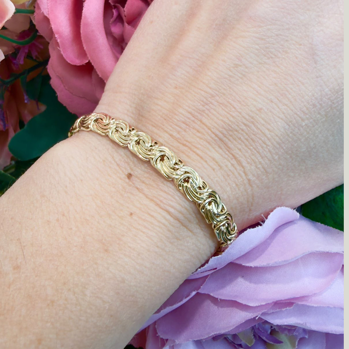 BRACCIALE A MAGLIA INTRECCIATA IN ORO GIALLO 18 KT (750)