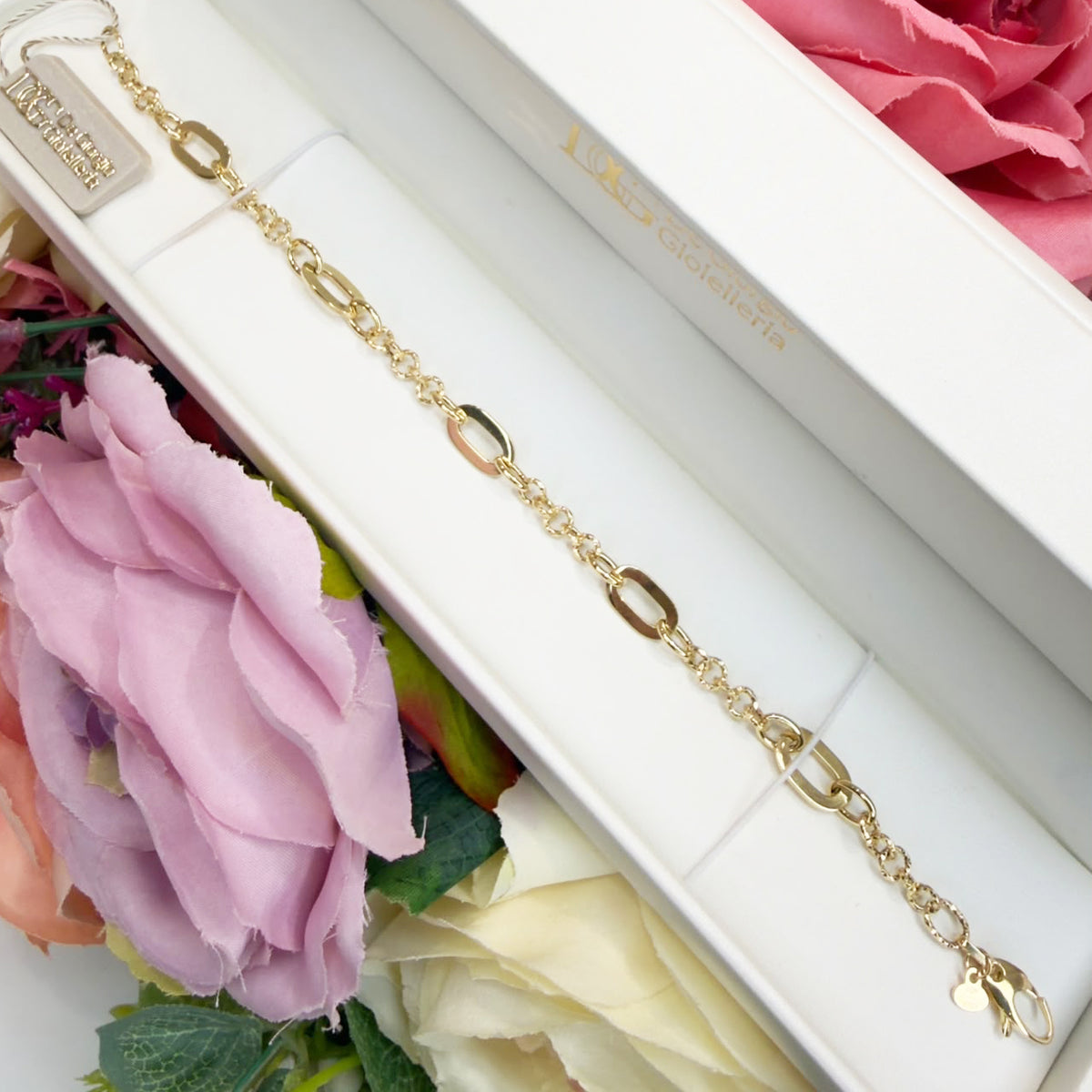 BRACCIALE A MAGLIE OVALI IN ORO GIALLO 18 KT (750)