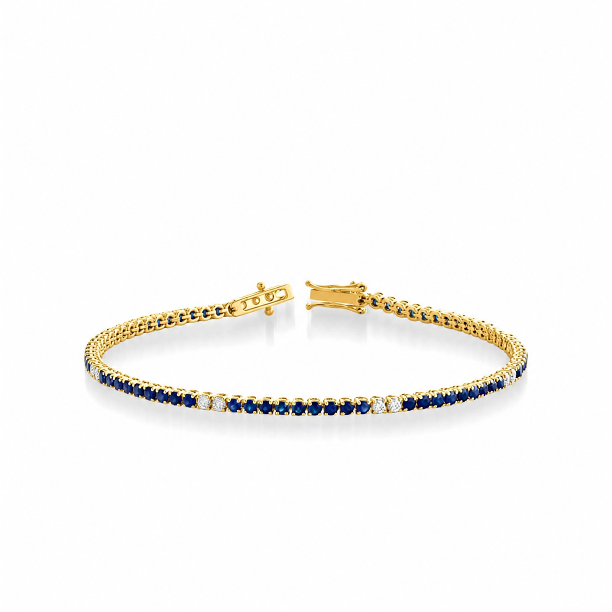 BRACCIALE TENNIS IN ORO GIALLO 18KT CON DIAMANTI E ZAFFIRI