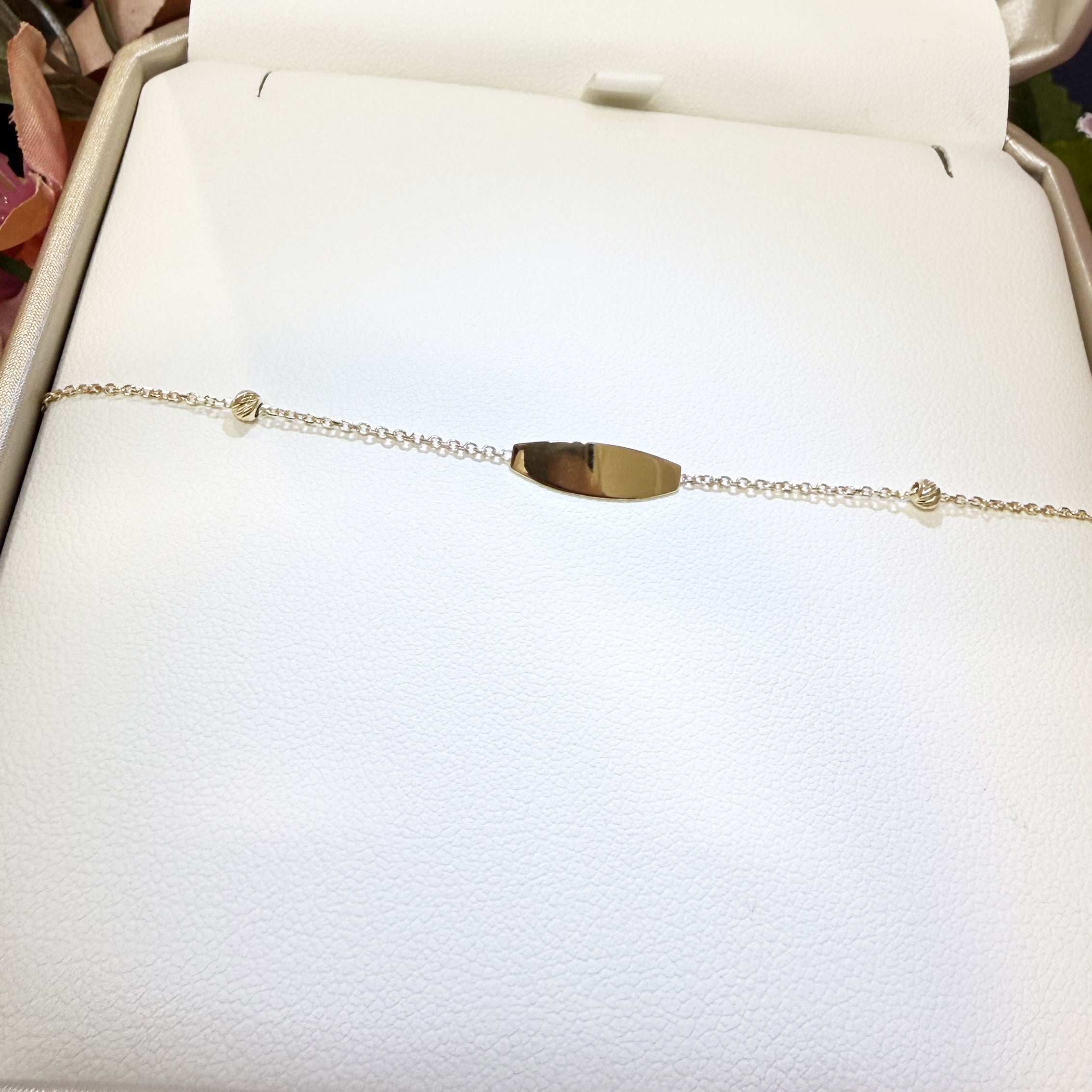 BRACCIALE BABY CON TARGHETTA E SFERETTE DIAMANTATE IN ORO GIALLO 18KT (750)