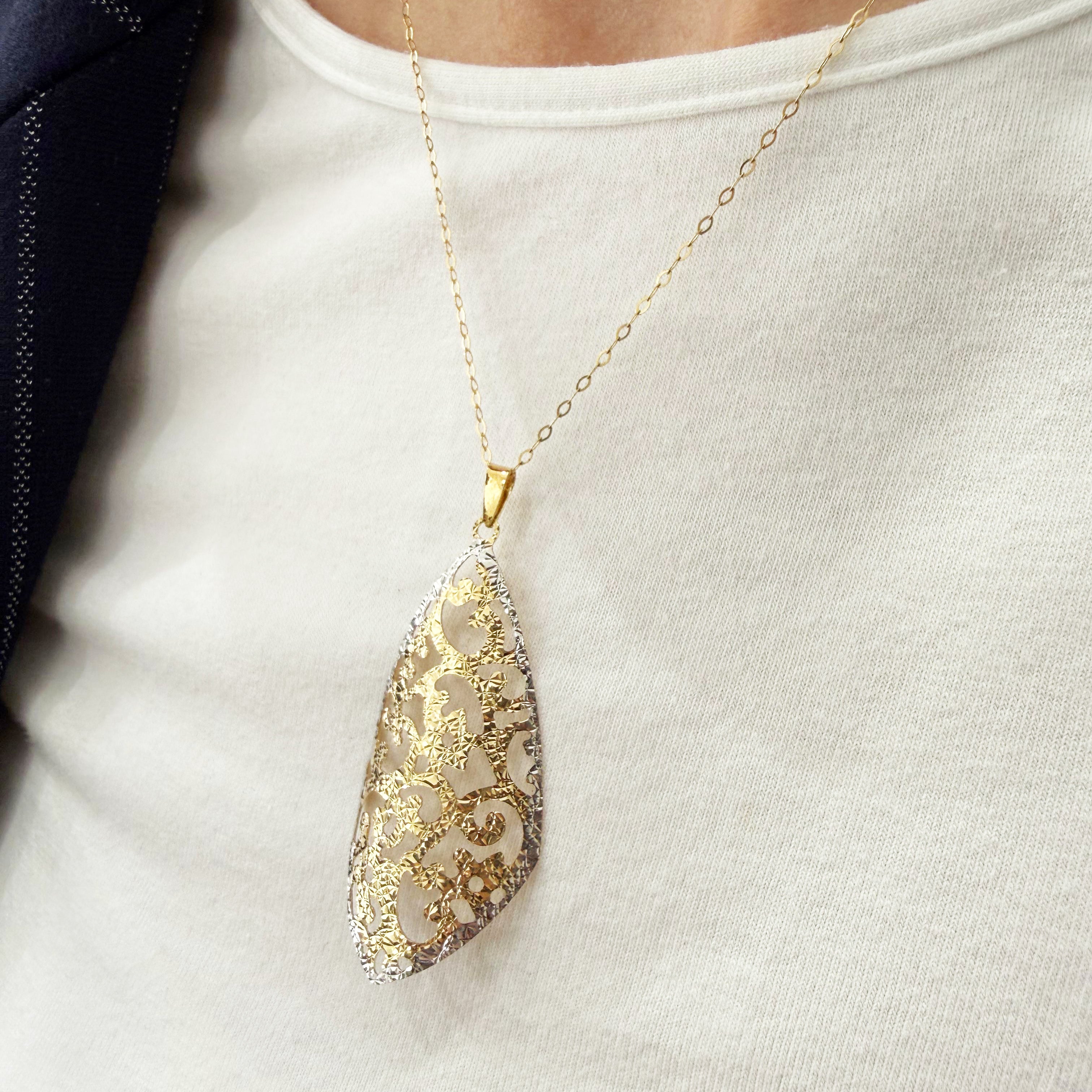 Ciondolo traforato fantasia in oro giallo e bianco 18KT (750) – Made in Italy