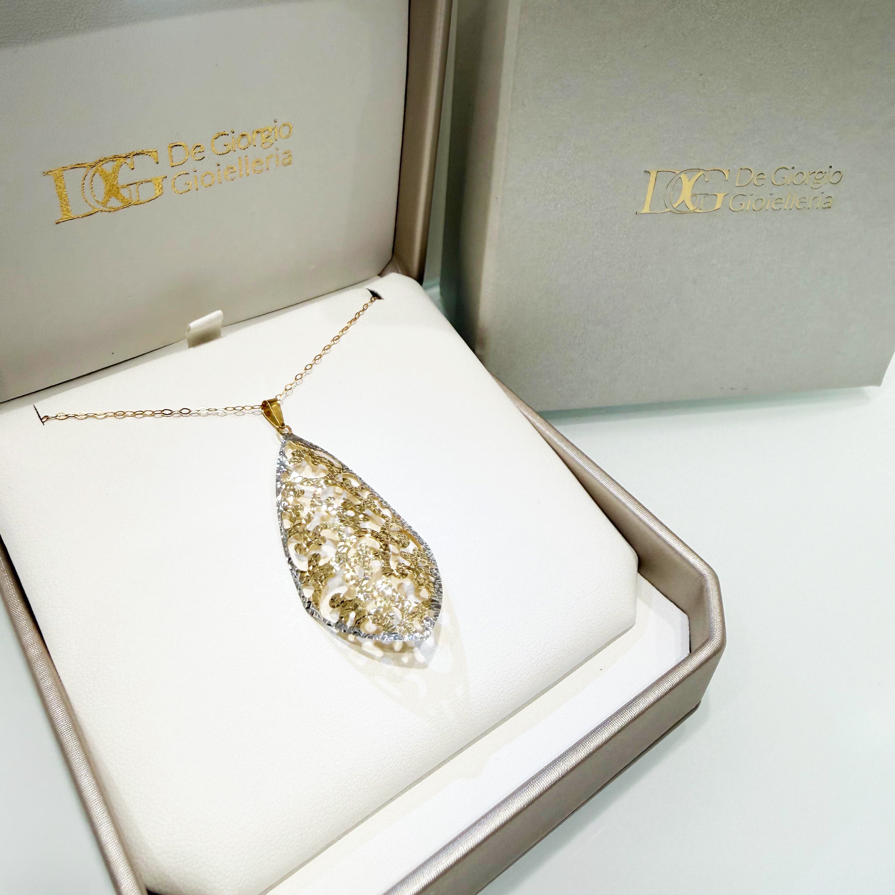 Ciondolo traforato fantasia in oro giallo e bianco 18KT (750) – Made in Italy