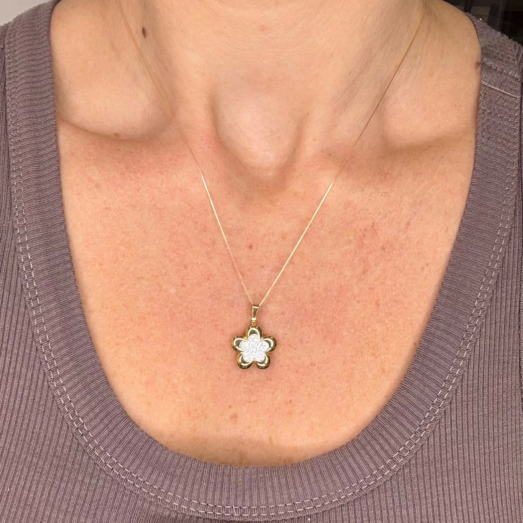COLLANA IN ORO GIALLO 18 KT (750) CON PENDENTE FIORE E ZIRCONI