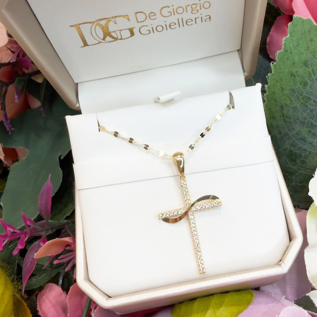 COLLANA CON CROCE SINUOSA IN ORO GIALLO 18 KT (750) E ZIRCONI