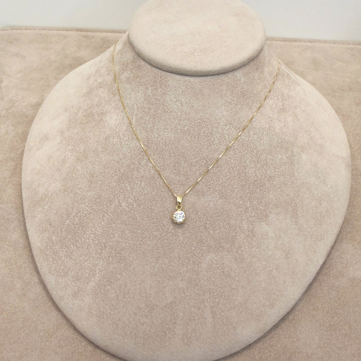 COLLANA IN ORO GIALLO 18 KT (750) CON PENDENTE PUNTO LUCE E ZIRCONI