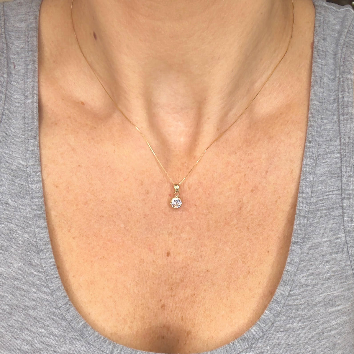 COLLANA IN ORO GIALLO 18 KT (750) CON PENDENTE PUNTO LUCE E ZIRCONI