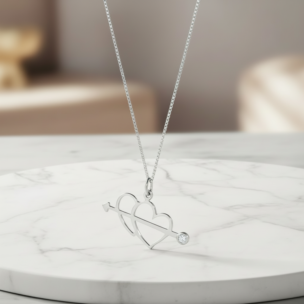 COLLANA CON CUORI IN ORO BIANCO 18 CARATI E DIAMANTE