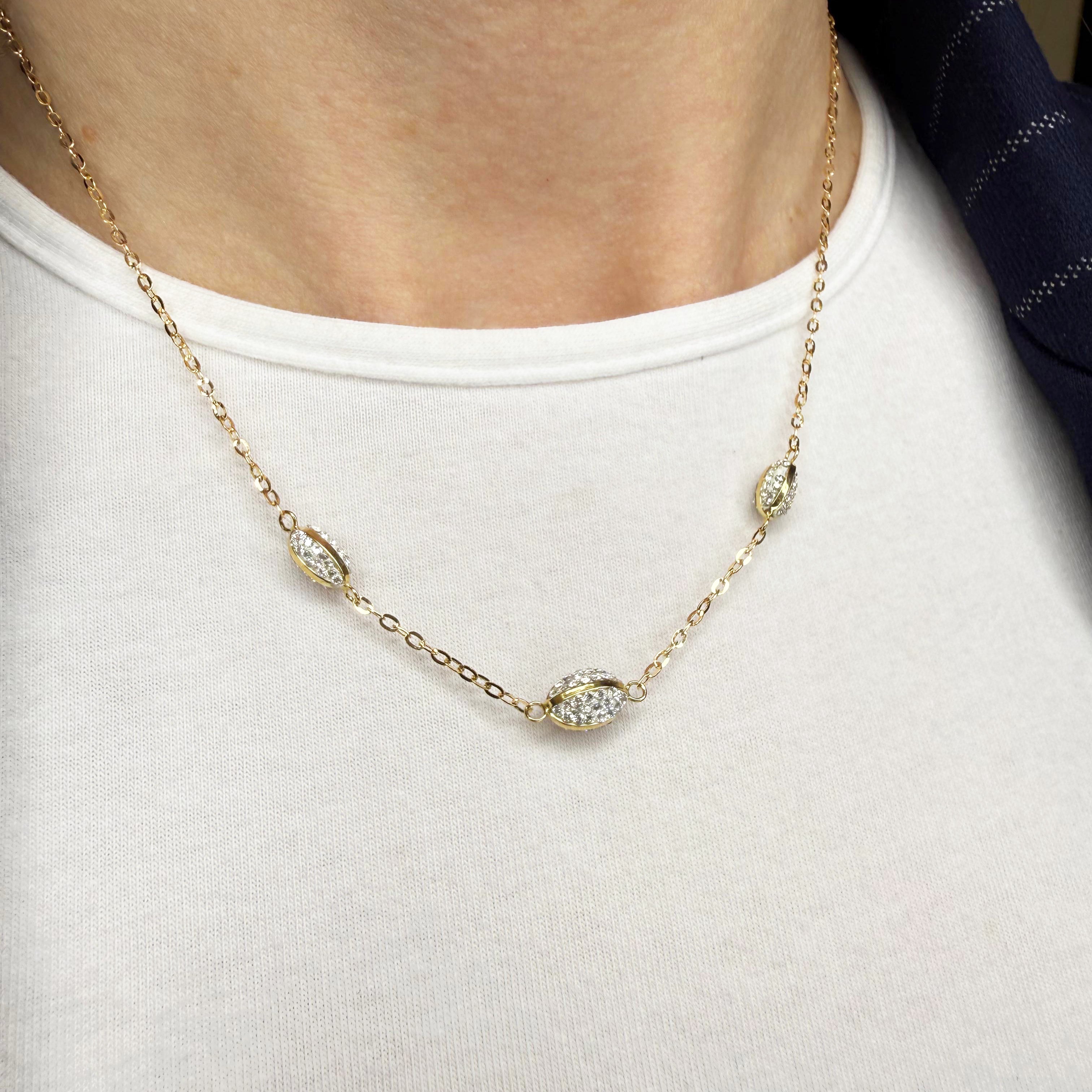 Collana con elementi ovali e zirconi in oro giallo e bianco 18KT (750) – Made in Italy