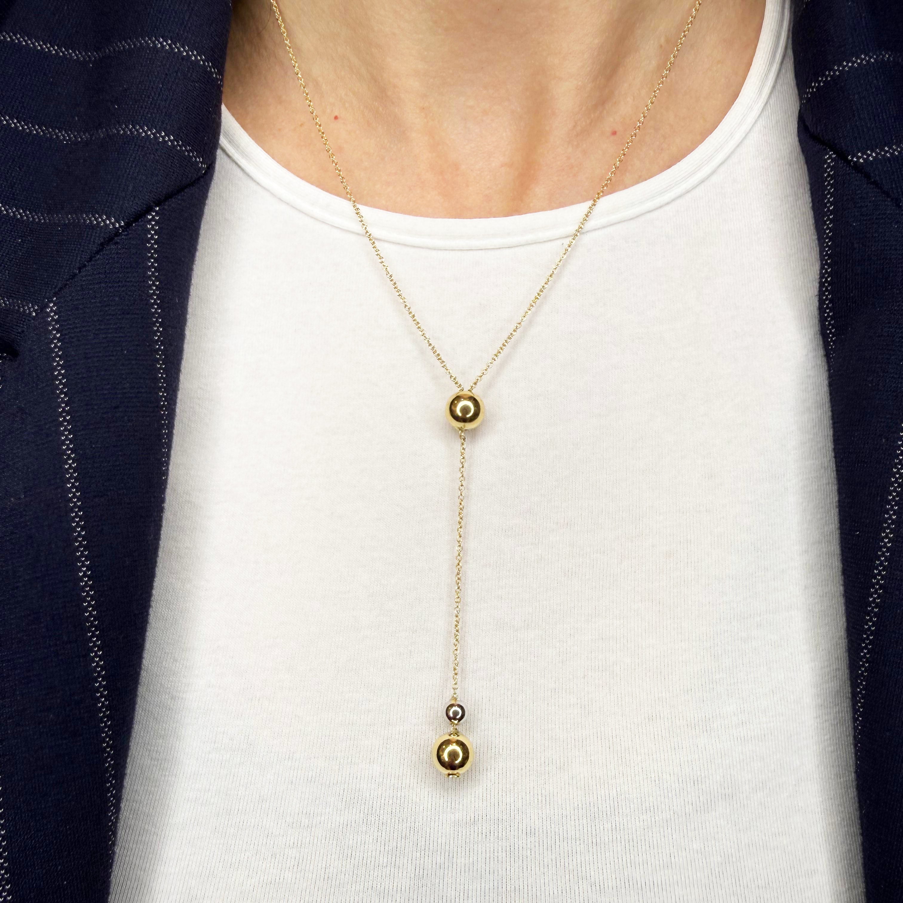 Collana lunga con sfere in oro giallo e bianco 18KT (750) – Made in Italy