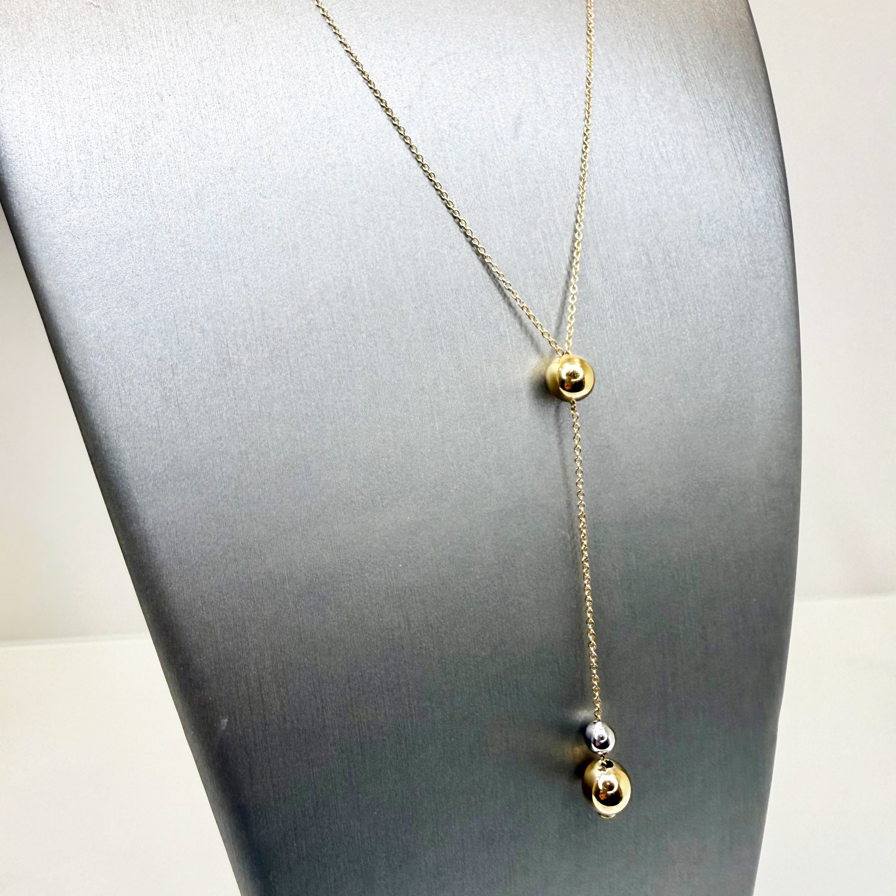 Collana lunga con sfere in oro giallo e bianco 18KT (750) – Made in Italy
