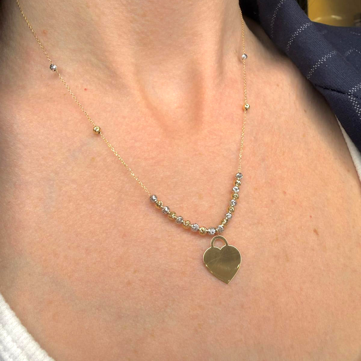 Collana con cuore incidibile in oro giallo 18KT (750) e sfere diamantate