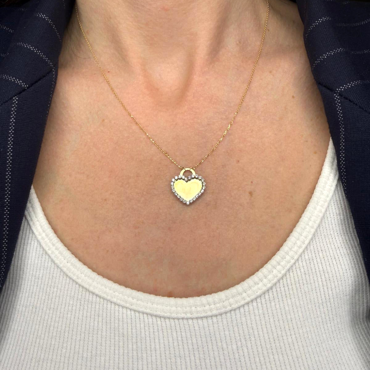 Collana con ciondolo cuore double face in oro giallo 18KT (750) con zirconi