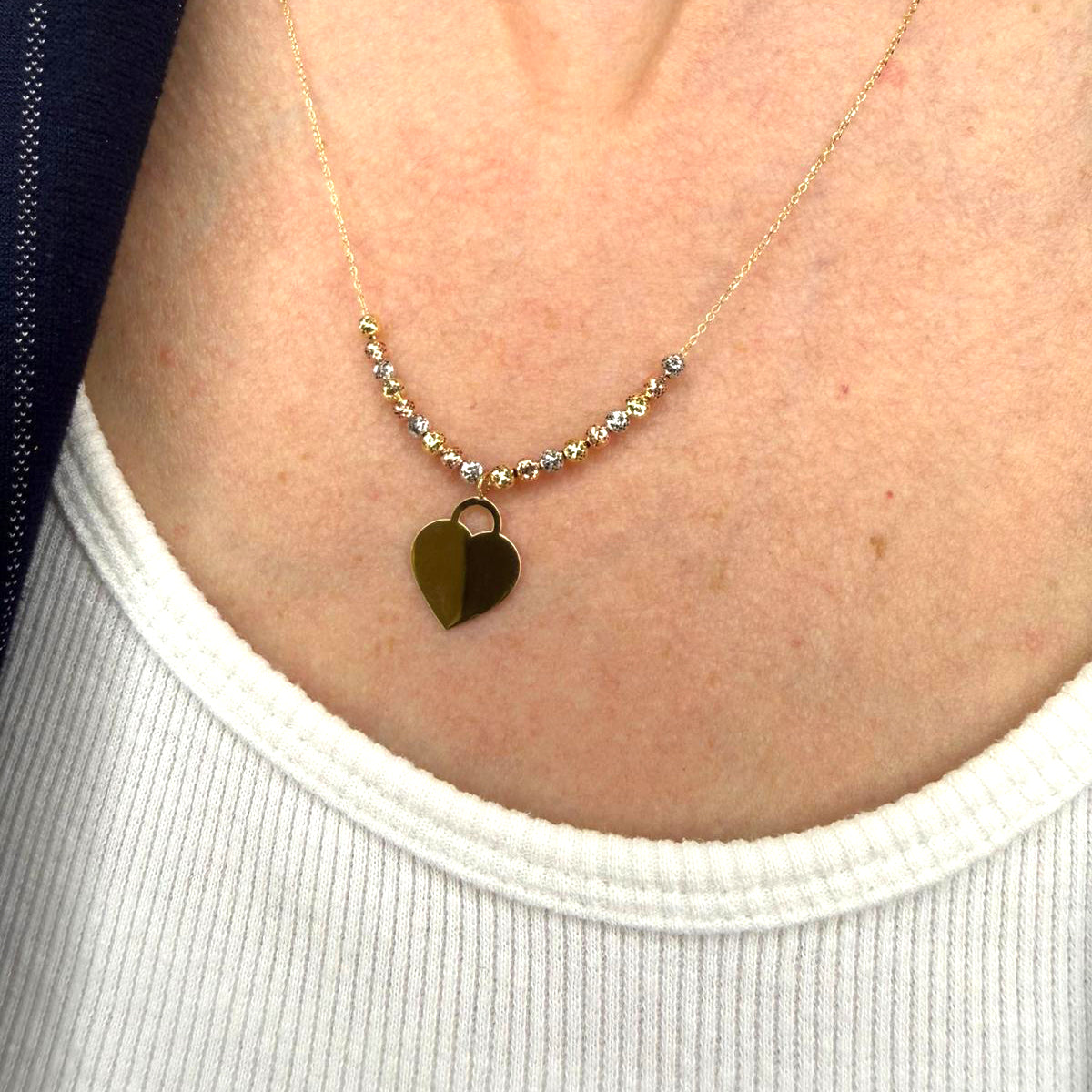 Collana con cuore incidibile in oro bianco, giallo e rosa 18KT (750) e sfere diamantate