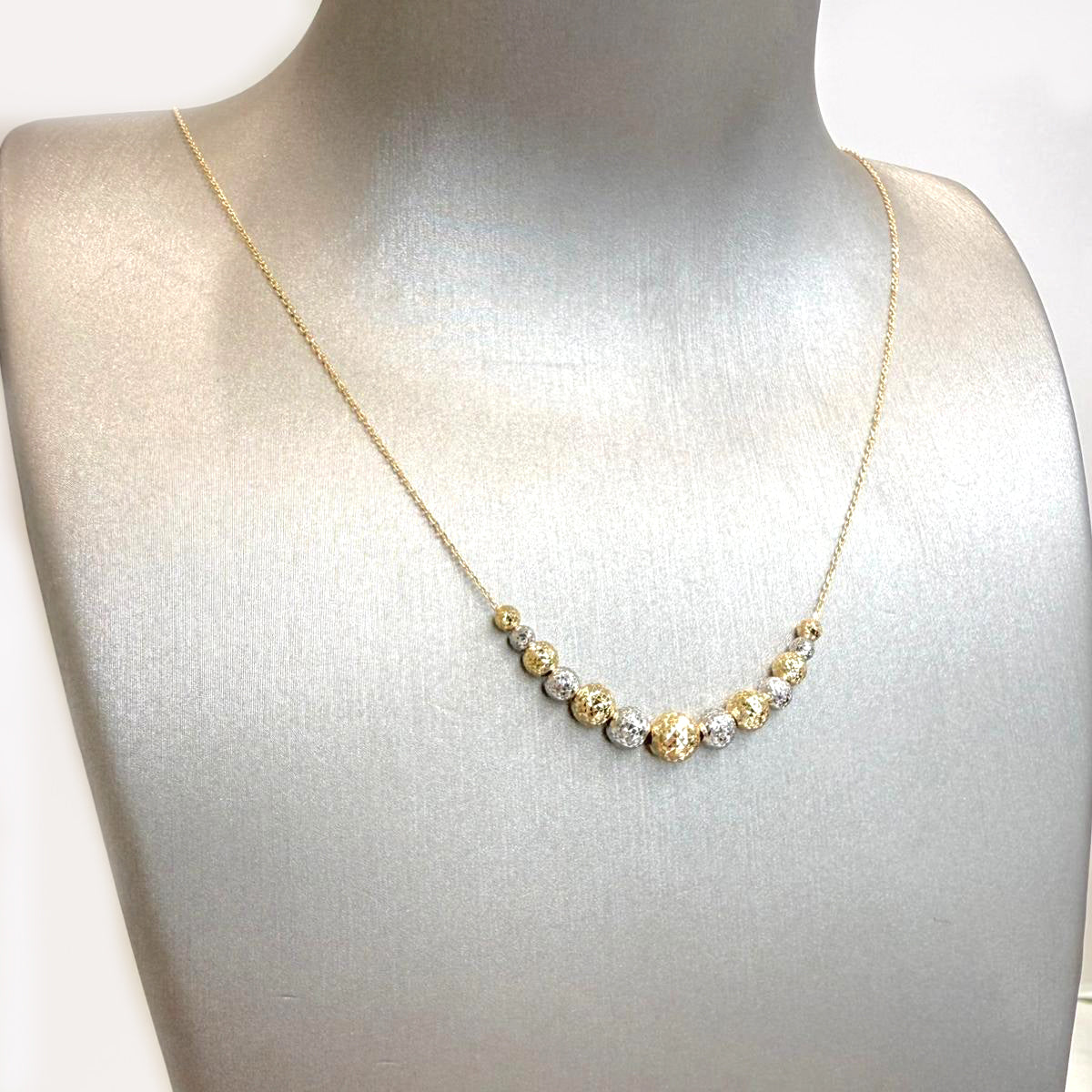 Collana con sfere diamantate bicolore in oro 18KT (750)