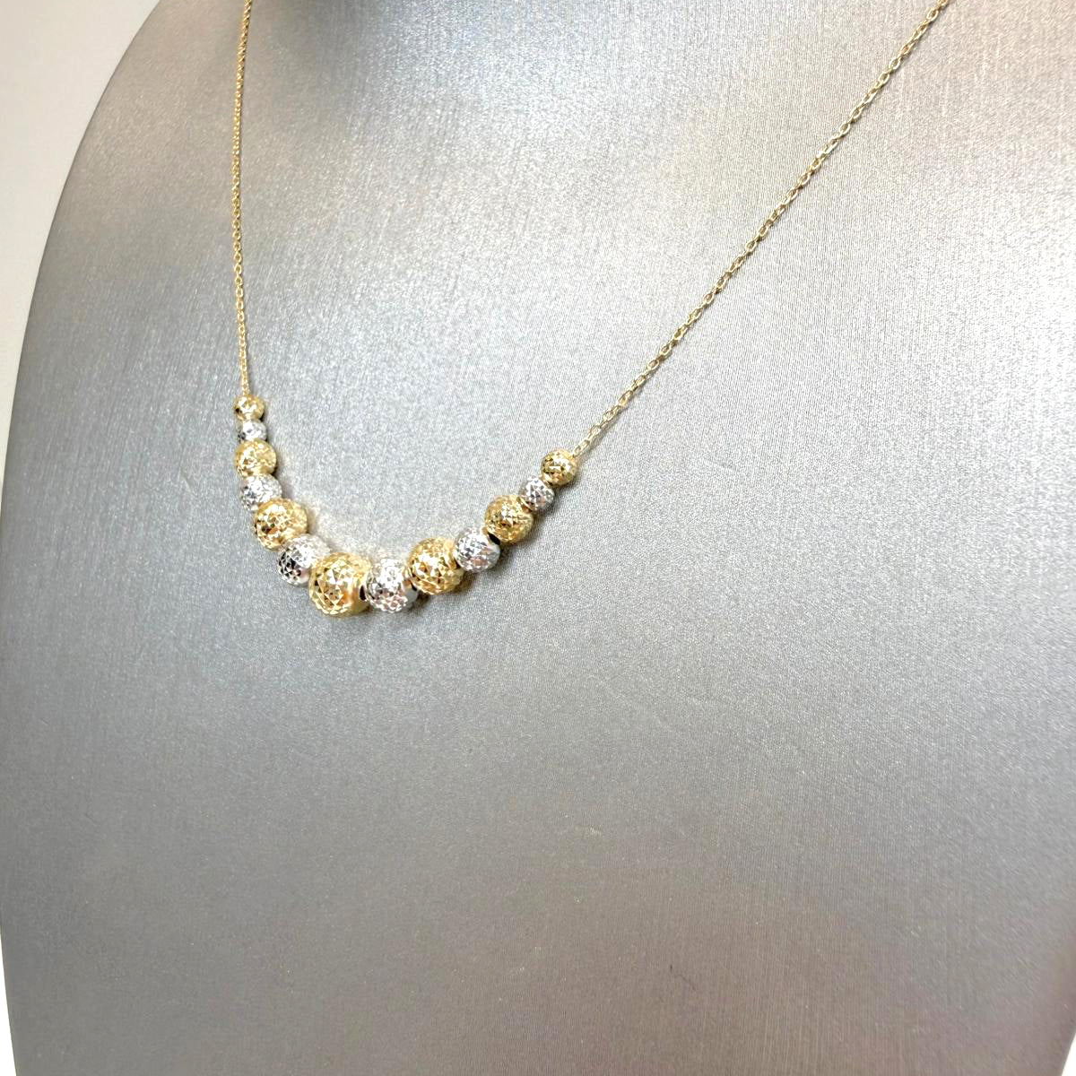 Collana con sfere diamantate bicolore in oro 18KT (750)