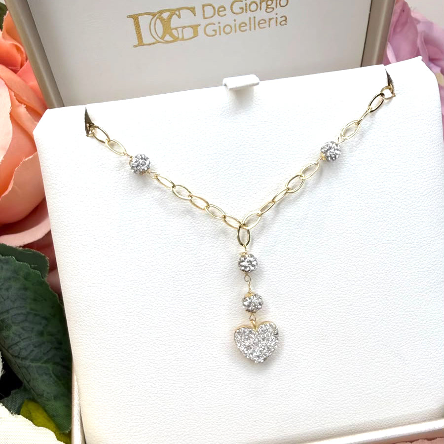 Collana con cuore pendente e sfere diamantate in oro giallo 18 KT (750)