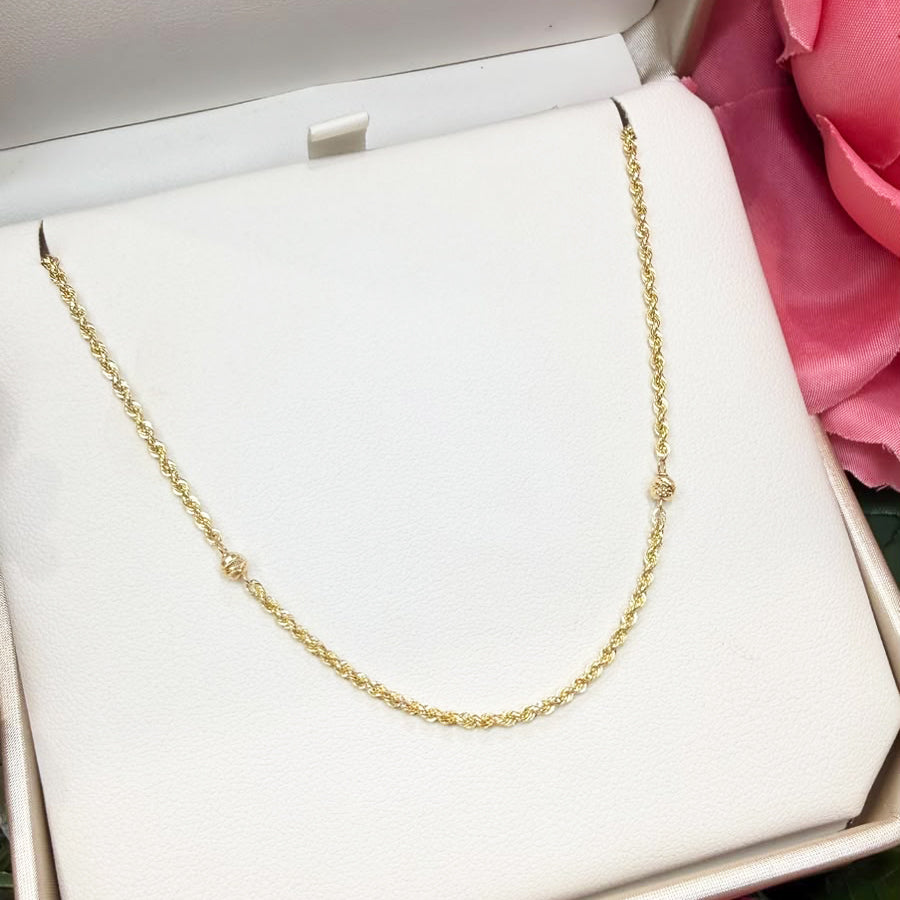 Collana torchon con sfere diamantate in oro giallo 18 KT (750)