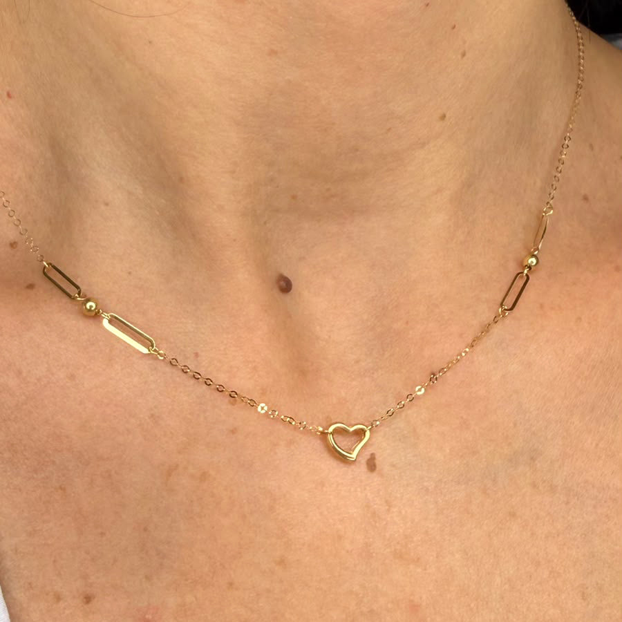Collana con cuore e maglie geometriche in oro giallo 18 KT (750)