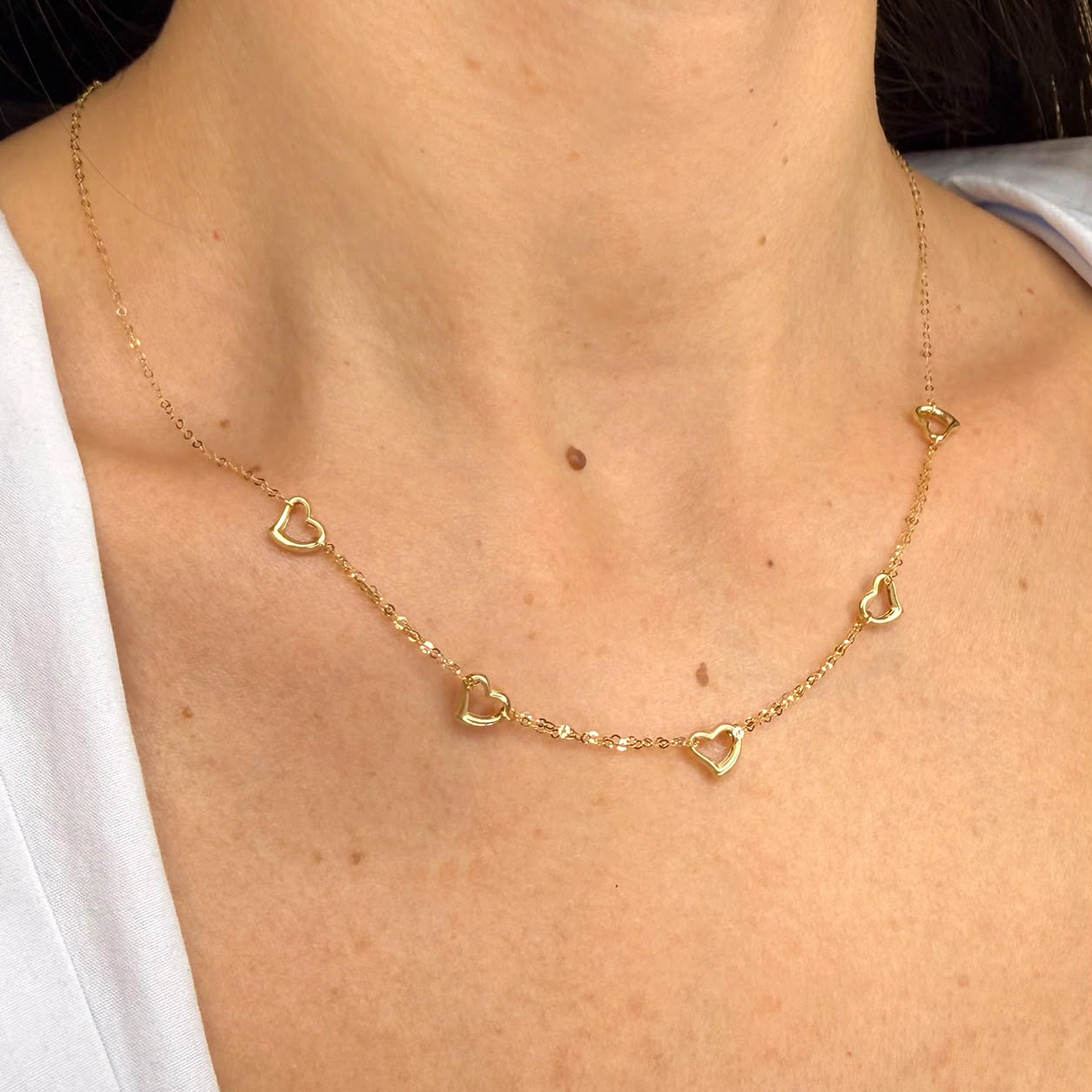 Collana con cuori traforati in oro giallo 18 KT (750)