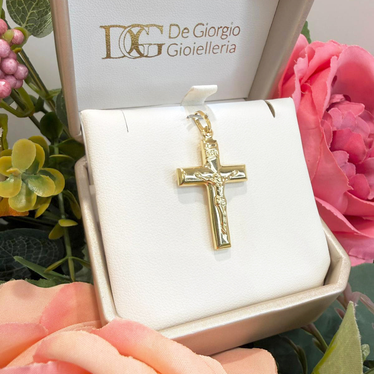Ciondolo croce con Cristo da uomo in oro giallo (750)