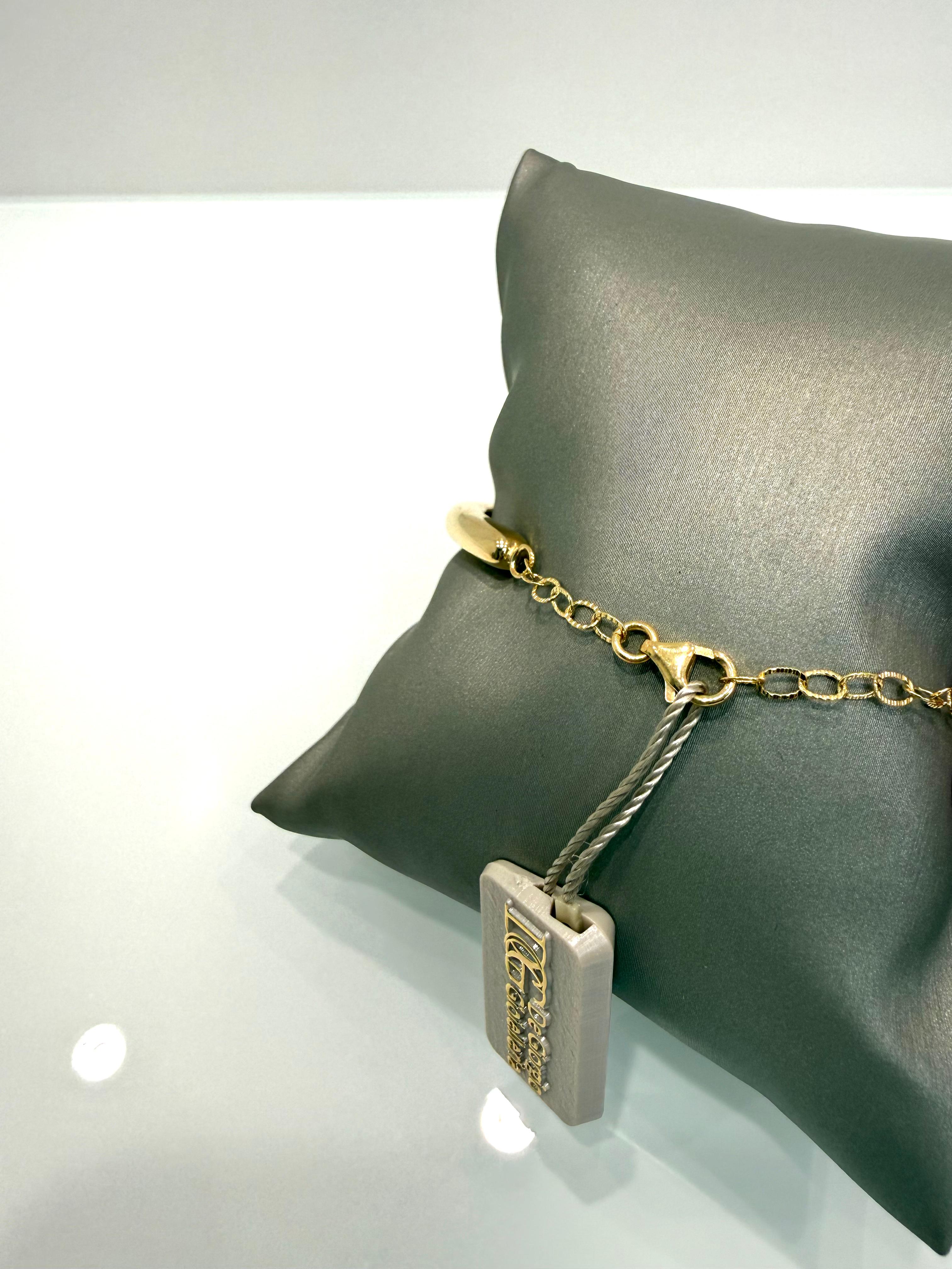 Bracciale rigido con nodo in oro giallo 18KT (750) – Made in Italy