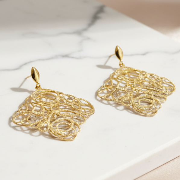 Orecchini pendenti in oro giallo e bianco 18KT (750)