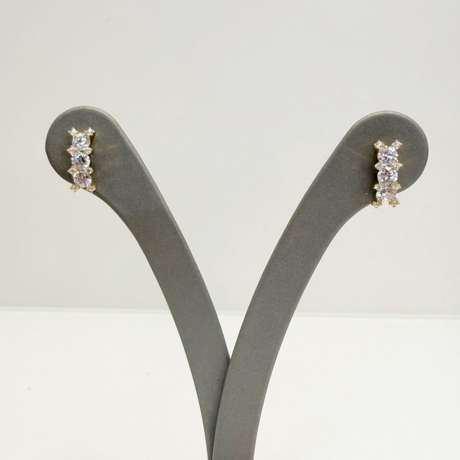 Orecchini trilogy con zirconi in oro giallo 18 KT (750)