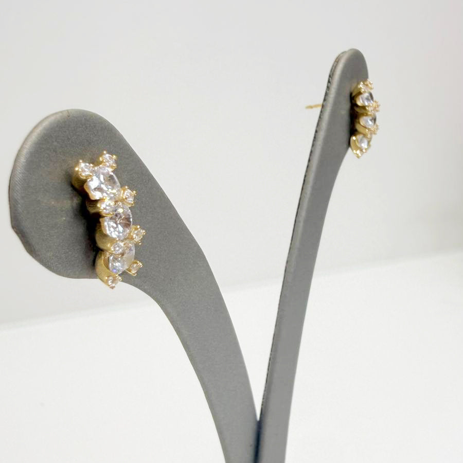 Orecchini trilogy con zirconi in oro giallo 18 KT (750)