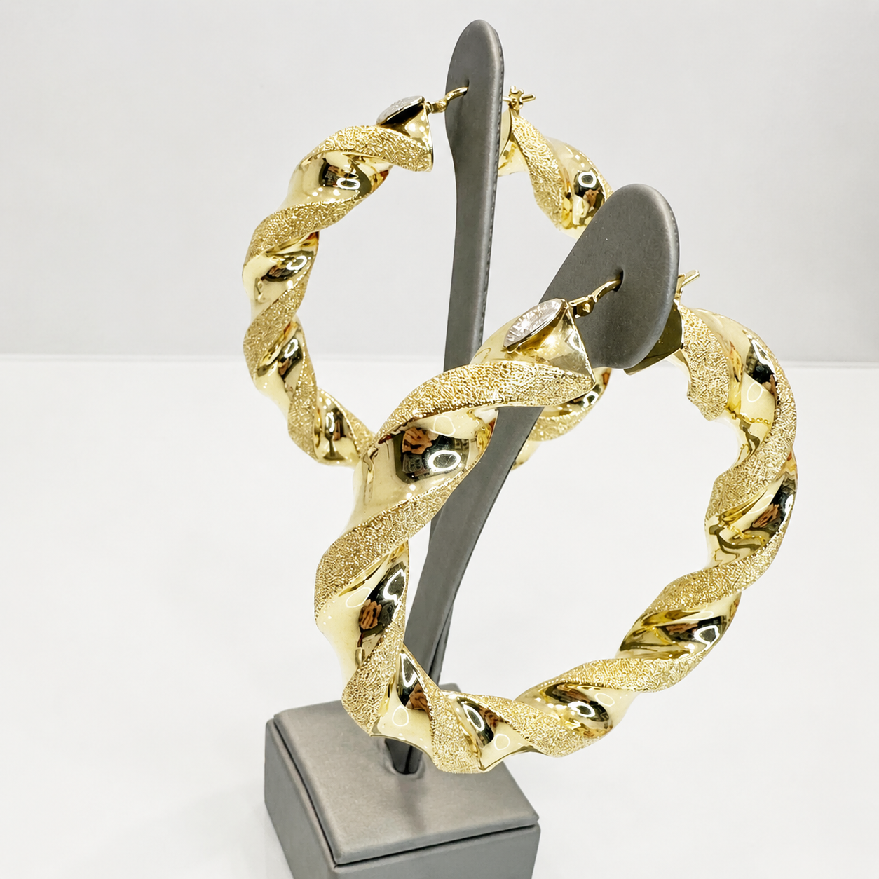 Orecchini torchon intrecciati in oro giallo 18 KT (750)