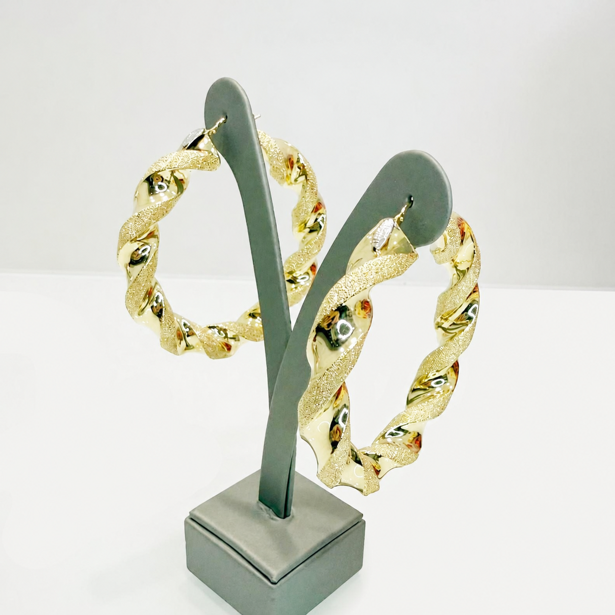 Orecchini torchon intrecciati in oro giallo 18 KT (750)