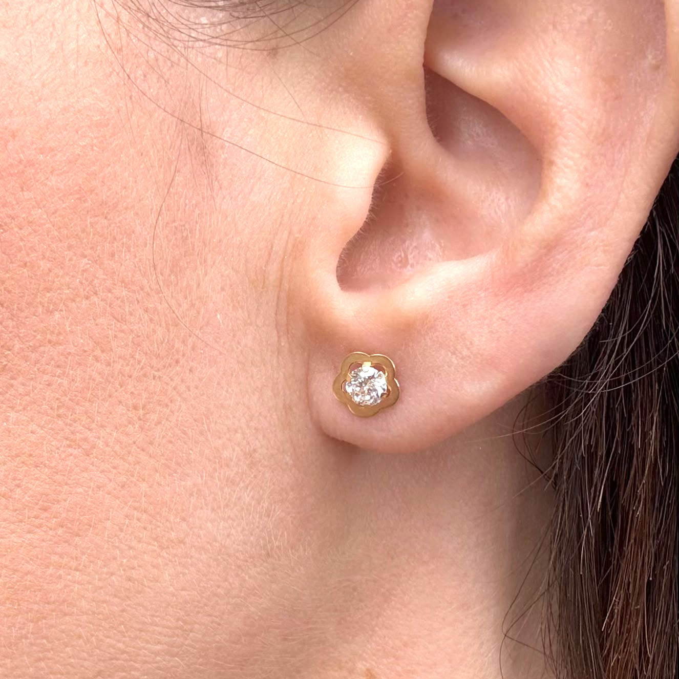 Orecchini fiore con zircone in oro giallo 18 KT (750)