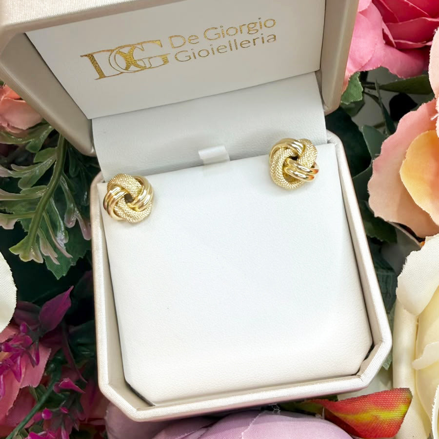ORECCHINI NODO INTRECCIATO CON LAVORAZIONE DIAMANTATA IN ORO GIALLO 18 KT