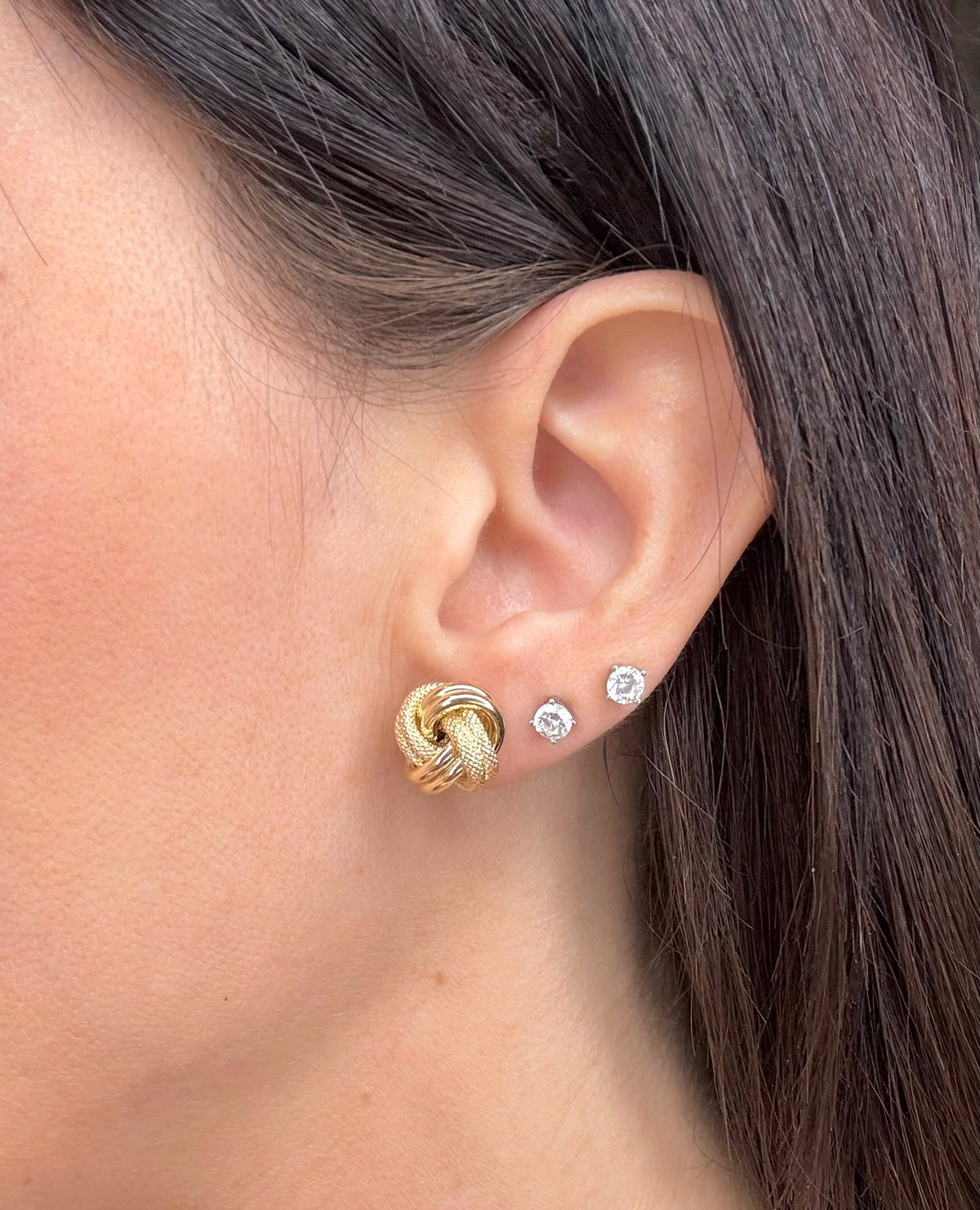 ORECCHINI NODO INTRECCIATO CON LAVORAZIONE DIAMANTATA IN ORO GIALLO 18 KT