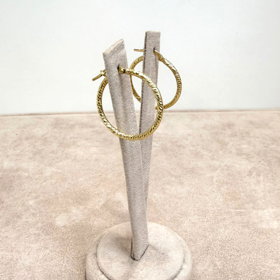 ORECCHINI A CERCHIO LAVORATI IN ORO GIALLO 18 KT (750)