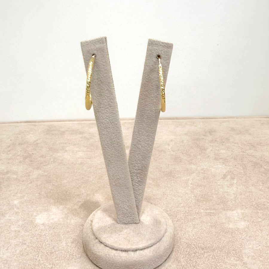 ORECCHINI A CERCHIO LAVORATI IN ORO GIALLO 18 KT (750)