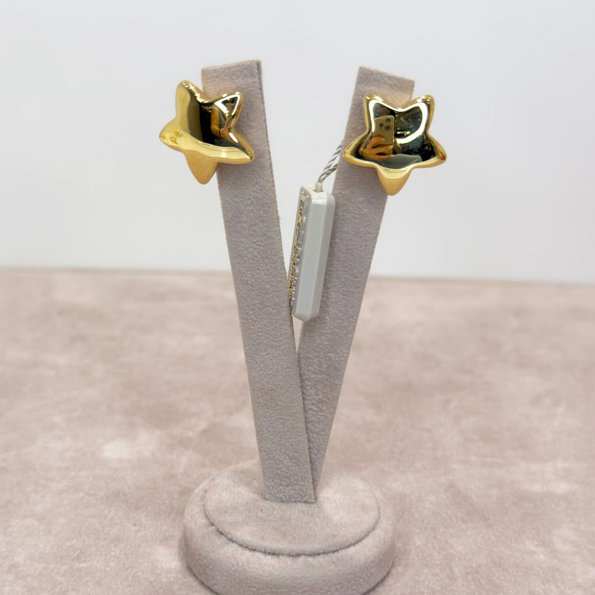 ORECCHINI A STELLA BOMBATA IN ORO GIALLO 18 KT (750)